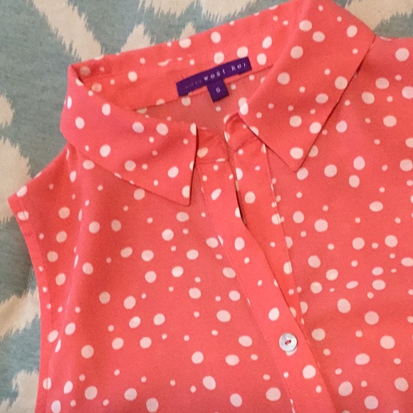 Coral colored white polka-dotted blouse with button front and tie closure. - Picture 2 of 5
